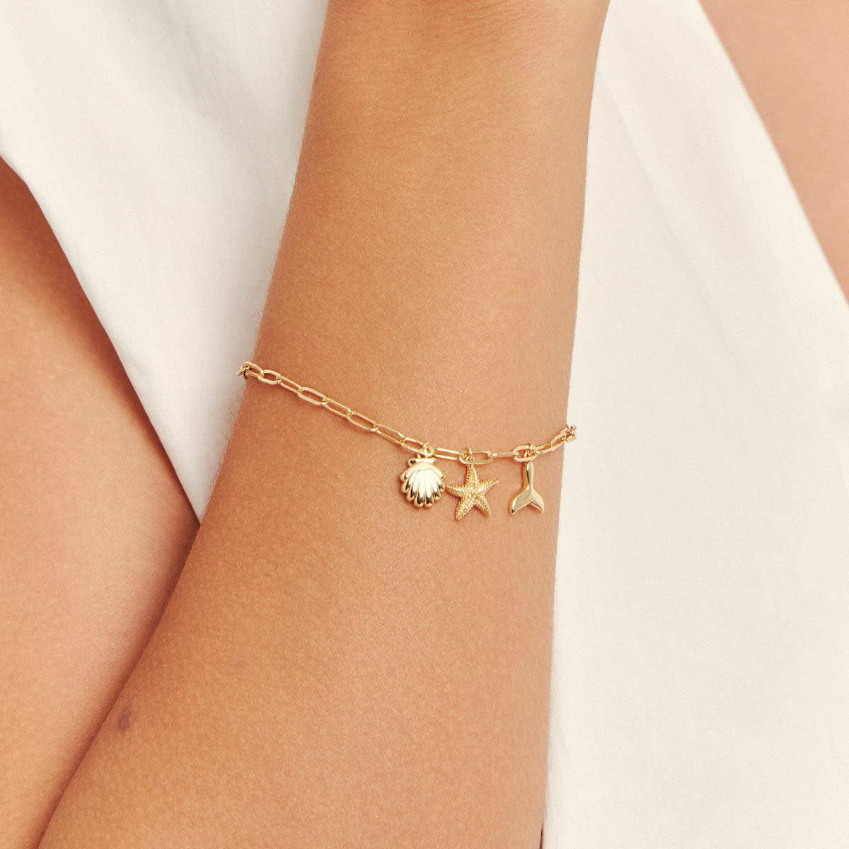 Pulseira Lisa com Concha, Estrela e Cauda