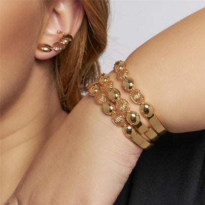 Brinco Ear Cuff com Ovais Lisos no Banho de Ouro 18K